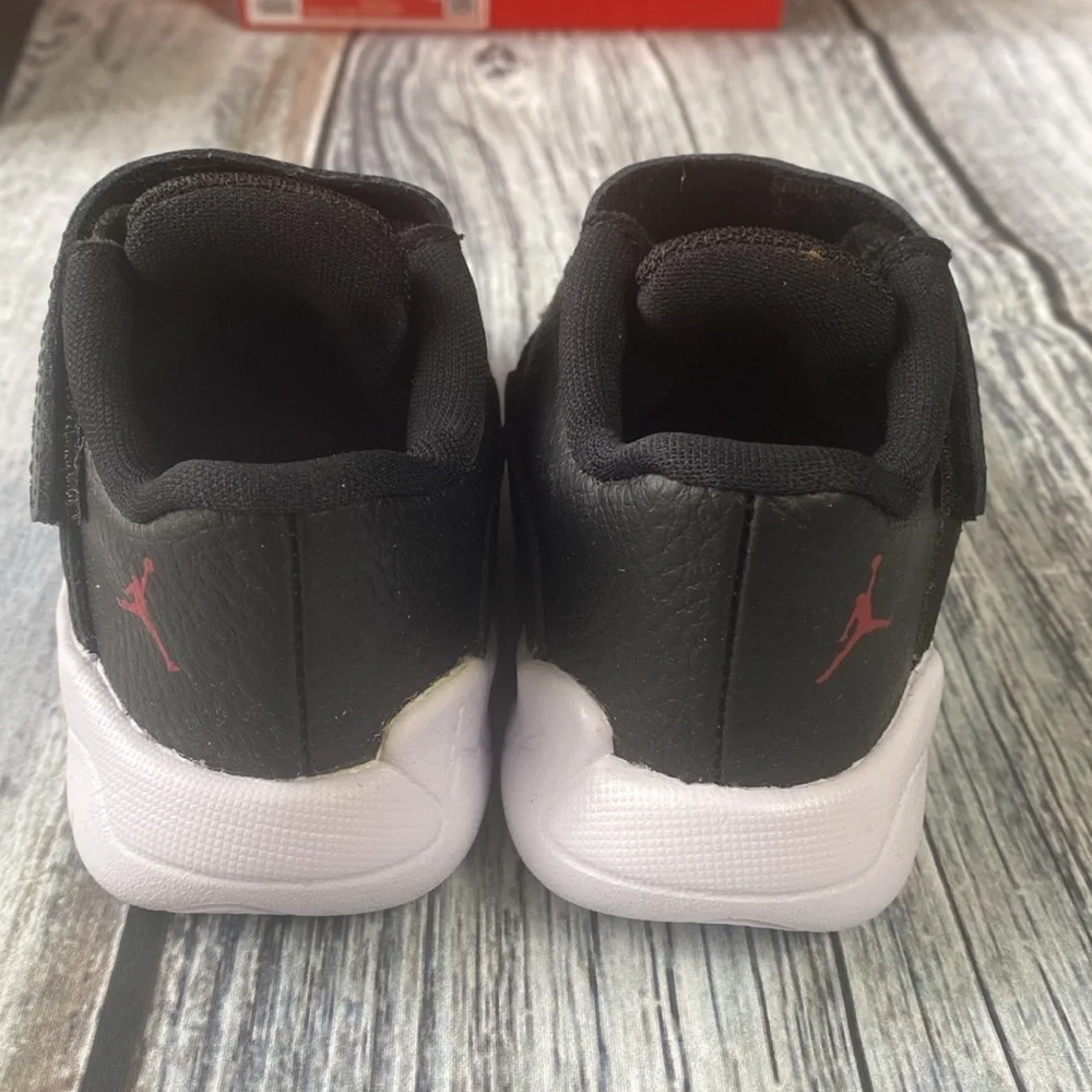 Kids Jordan 11 CMFT LOW Black Sneakers with Red Accents SIZE 8C
